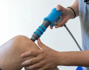 physical therapy of the knee and the foot with shock wave -Physiotherapy Salford - Media City, Salford Physiotherapy, first-class physiotherapy, Back pain management, Shockwave therapy Salford